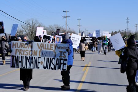 outside the Women's Huron Valley Correctional Facility in Ypsilanti to protest against the prison's operation