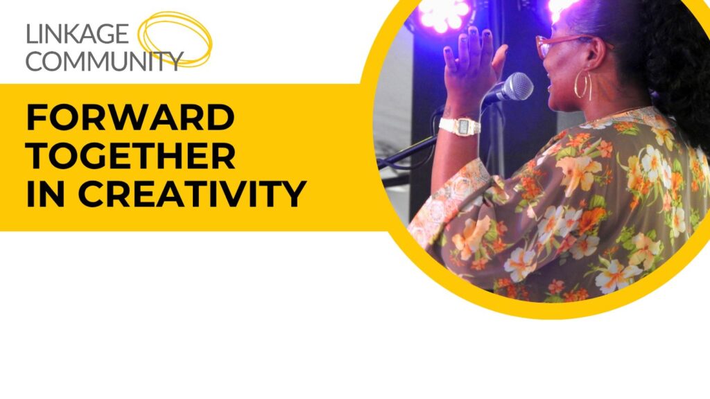 A photo of a black woman speaking into a microphone, stage lights in front of her, is encircled on the right side of a yellow and white graphic. To the left is the text: Linkage Community, Forward together in creativity.
